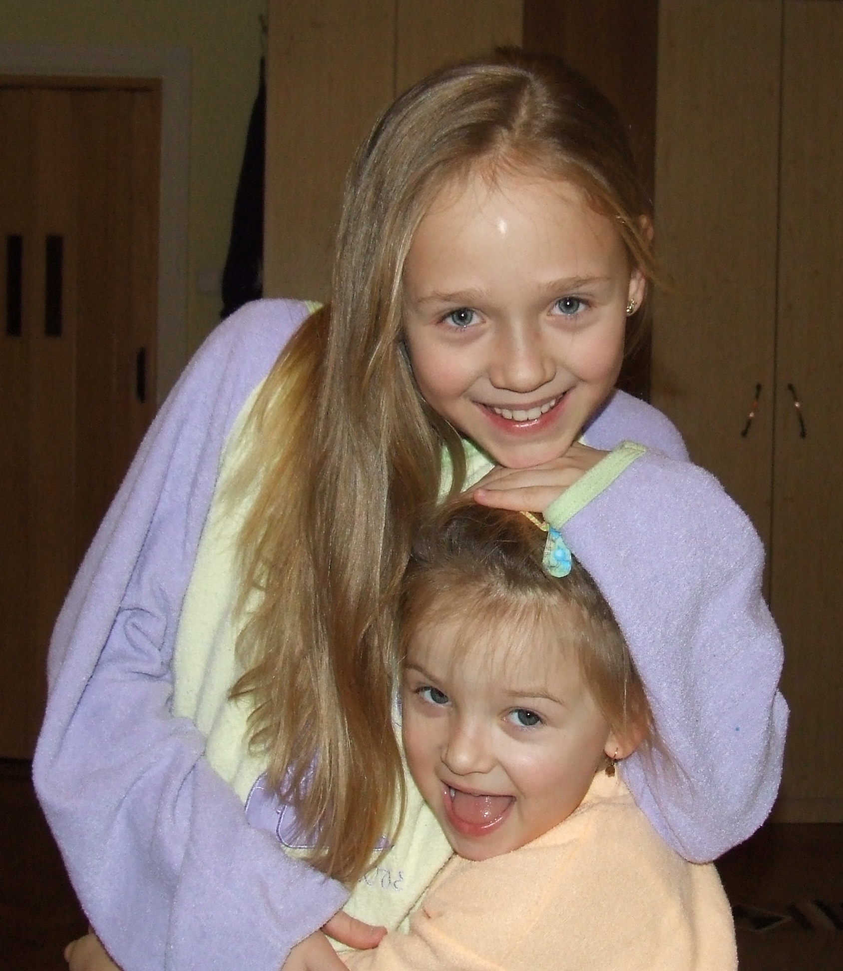 And yes, I totally just inserted of a photo of me and my little sister hugg...